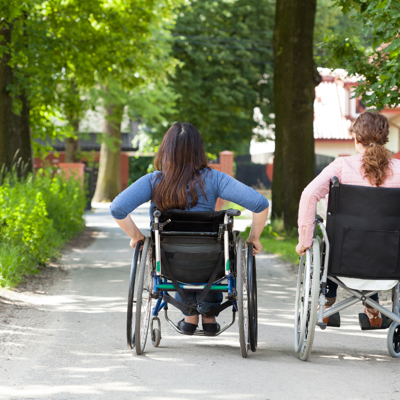 Two women in wheelchairs