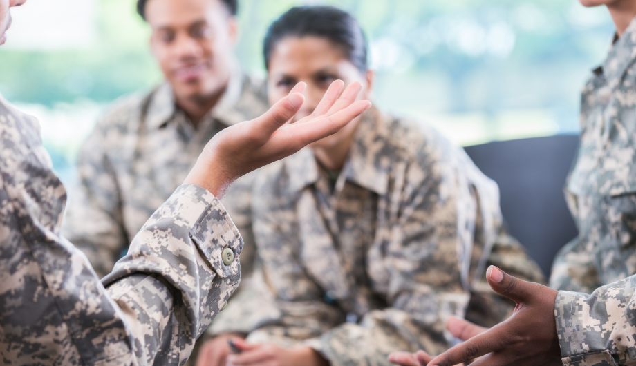 A group of army veterans talking.