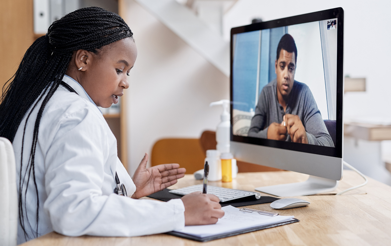 A woman GP on a video call with a male patient.